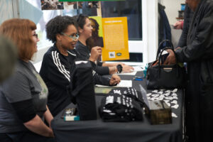 volunteers checking in attendees at compassionate cannabis event