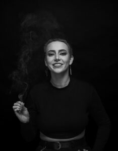 Non-binary Jane enjoying cannabis